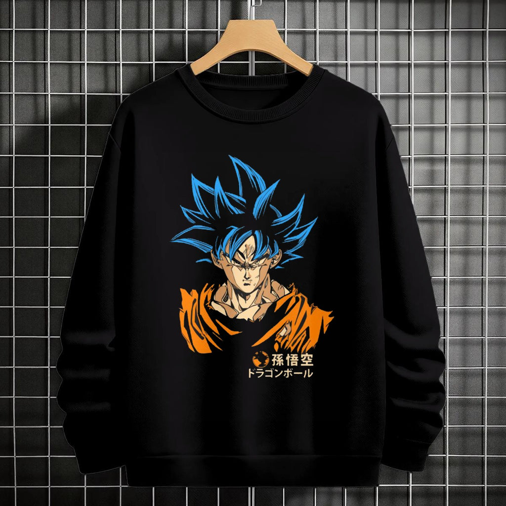 Black crewneck sweatshirt featuring Goku shadow silhouette with blue and pink neon aura and vertical Japanese text, flat lay on grey background.