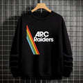 Black sweatshirt with 'ARC Raiders' logo on a hanger against a tiled wall.