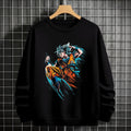 Black crewneck sweatshirt featuring Goku shadow silhouette with blue and pink neon aura and vertical Japanese text, flat lay on grey background.