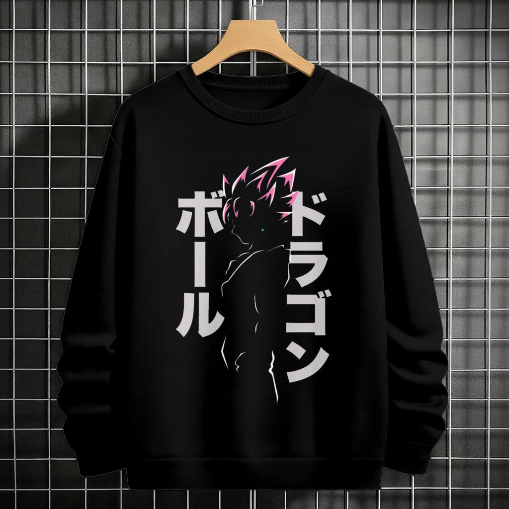 Black crewneck sweatshirt featuring Goku shadow silhouette with blue and pink neon aura and vertical Japanese text, flat lay on grey background.