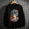 Black crewneck sweatshirt featuring Goku shadow silhouette with blue and pink neon aura and vertical Japanese text, flat lay on grey background.