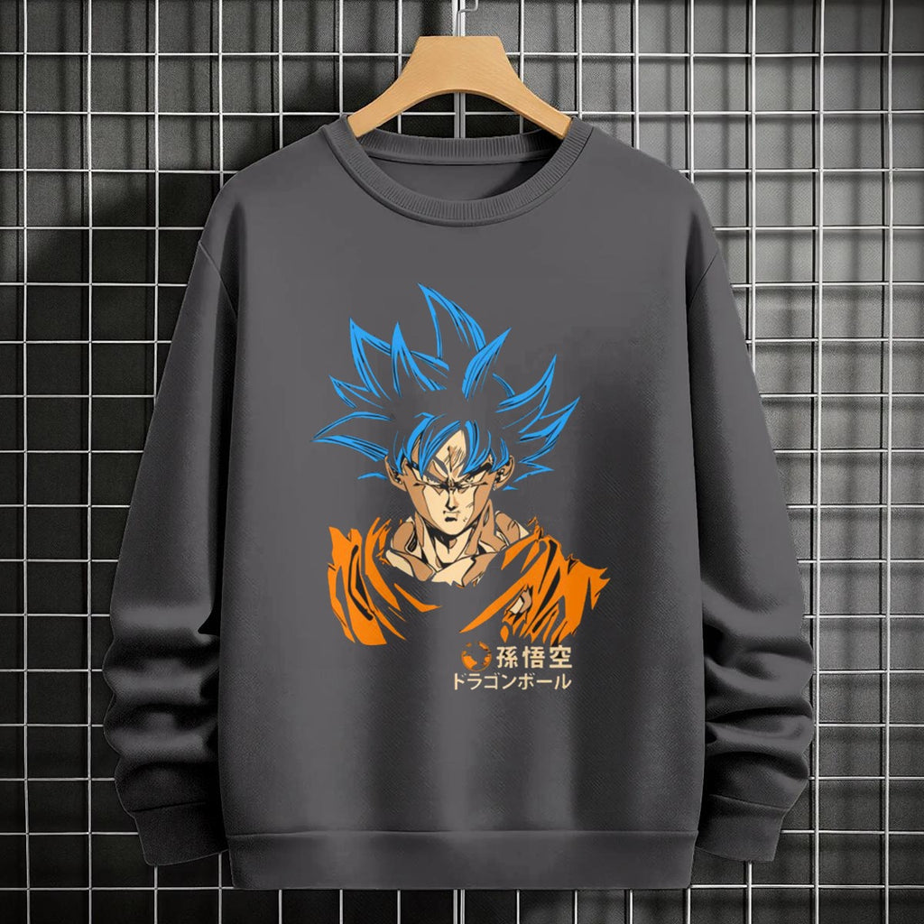 Black crewneck sweatshirt featuring Goku shadow silhouette with blue and pink neon aura and vertical Japanese text, flat lay on grey background.