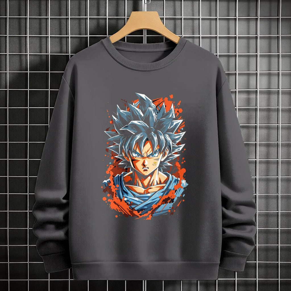 Black crewneck sweatshirt featuring Goku shadow silhouette with blue and pink neon aura and vertical Japanese text, flat lay on grey background.