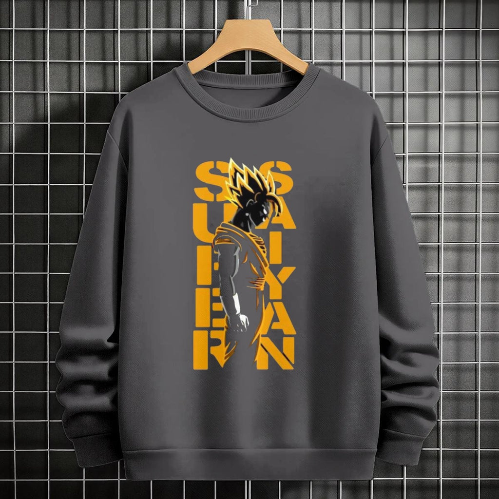Black crewneck sweatshirt featuring Goku shadow silhouette with blue and pink neon aura and vertical Japanese text, flat lay on grey background.