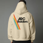 Beige hoodie with 'ARC Raiders' text and rainbow stripes on the back against a gray background