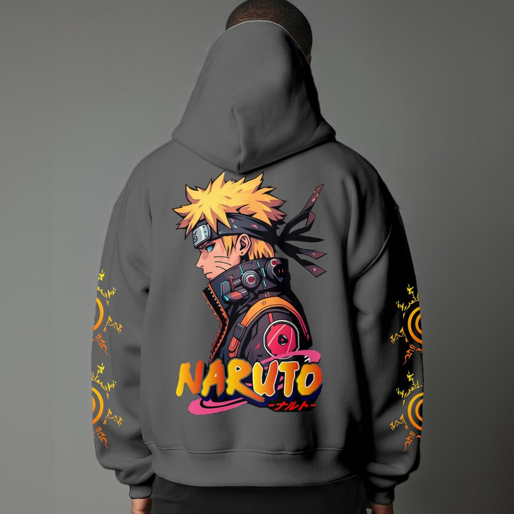 Black pullover hoodie featuring Naruto Uzumaki portrait on chest and vertical orange Japanese Kanji text on sleeves, worn by model on grey background.