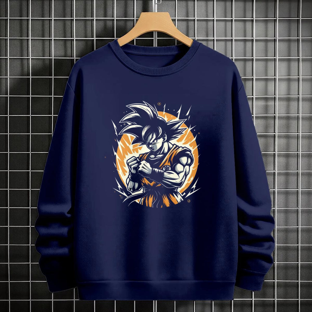 Black crewneck sweatshirt featuring Goku shadow silhouette with blue and pink neon aura and vertical Japanese text, flat lay on grey background.