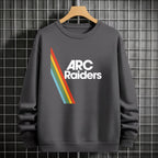 Gray sweatshirt with 'ARC Raiders' logo on a hanger against a tiled wall background