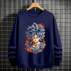 Black crewneck sweatshirt featuring Goku shadow silhouette with blue and pink neon aura and vertical Japanese text, flat lay on grey background.
