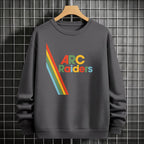 Gray sweatshirt with 'ARC Raiders' design on a hanger against a tiled wall background