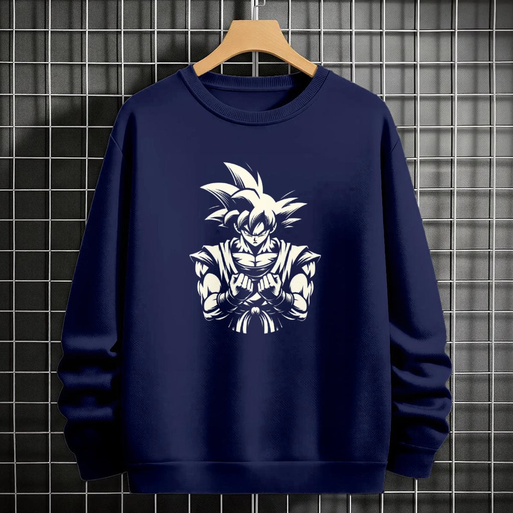 Black crewneck sweatshirt featuring Goku shadow silhouette with blue and pink neon aura and vertical Japanese text, flat lay on grey background.