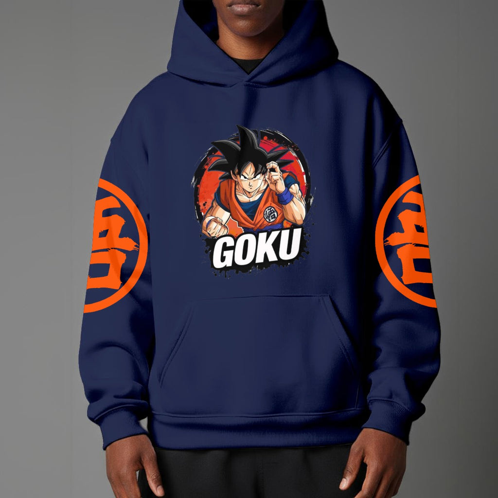 Black pullover hoodie with orange Goku silhouette on chest and vintage 1984 Dragon Ball graphics on sleeves, worn by model on grey background.