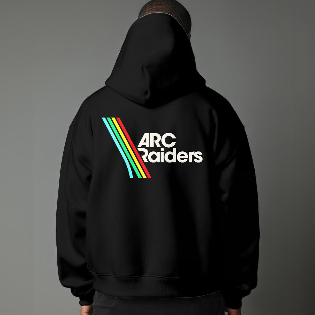 Person wearing a black hoodie with 'ARC Raiders' logo on the back against a gray background