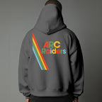 Person wearing a gray hoodie with 'ARC Raiders' colorful text design on the back against a gray background