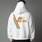 Person wearing a white hoodie with 'ARC Raiders' text and rainbow design on the back against a gray background